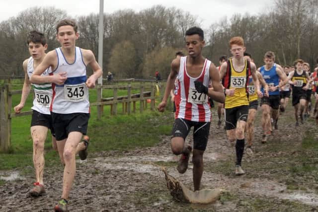 City of Portsmouth's Lachlan Wellington leads the under-15 race at Fairthorne Manor. Picture: Mick Young