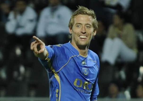 Peter Crouch celebrates after scoring his second goal at Guimaraes in October 2008    Picture: Steve Reid