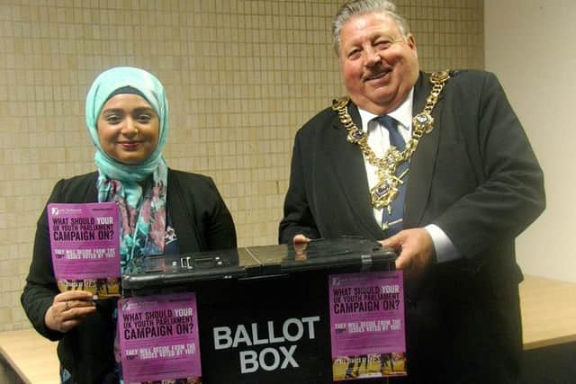 ELECTION Portsmouth Youth Parliament chair Sayeeda Nur and Mayor Frank Jonas counting votes in the youth parliaments Make Your Mark consultation