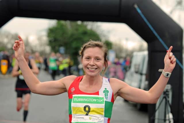 Natasha Doel celebrates her Stubbington 10k win in 2015