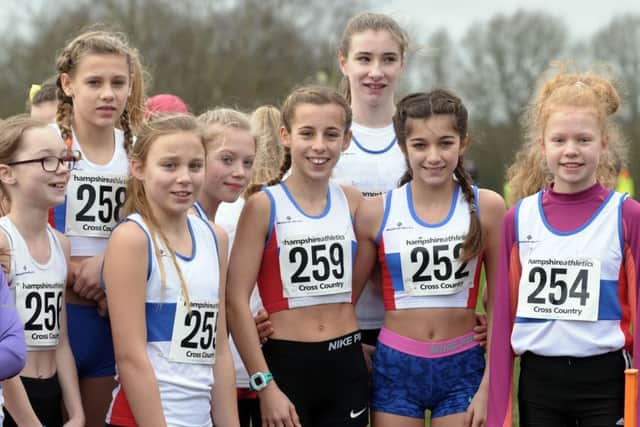 Saffron Moore and Nicole Ainsworth with their City of Portsmouth club-mates at Fairthorne Manor. Picture: Mick Young (151783-05)