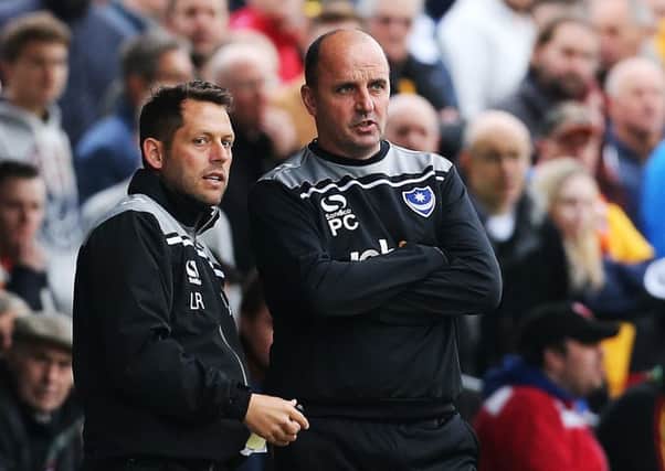 Pompey boss Paul Cook, right   Picture: Joe Pepler