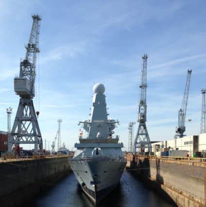 HMS Dragon returns to the water after an extensive refit