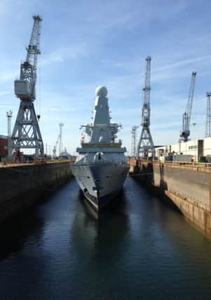 HMS Dragon returns to the water after an extensive refit