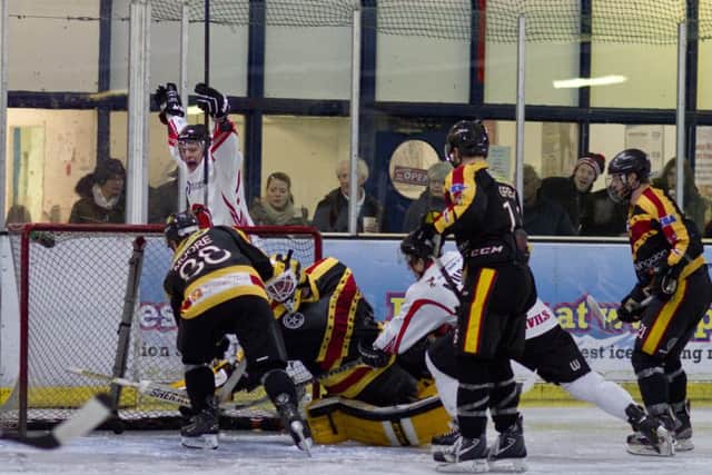 Solent Devils player Mitchell Murray celebrates Ben Lock's goal against Oxford City Stars. Picture: Dave Chapman