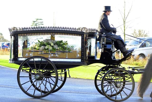 Clare Baillie's coffin is brought into The Oaks, Havant yesterday for her funeral Picture: Malcolm Wells (160114-4812)