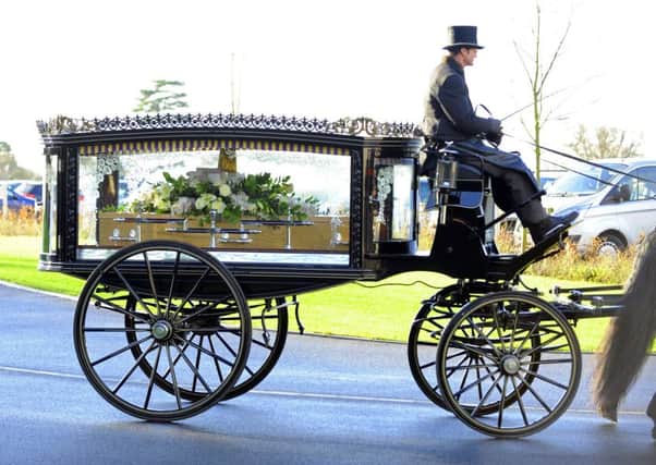 Clare Baillie's coffin is brought into The Oaks, Havant yesterday for her funeral Picture: Malcolm Wells (160114-4812)