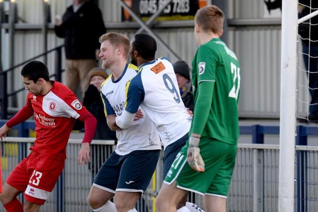 Josh Hill celebrates his goal with Shamir Mullings. Picture: Paul Jacobs (160012-2)