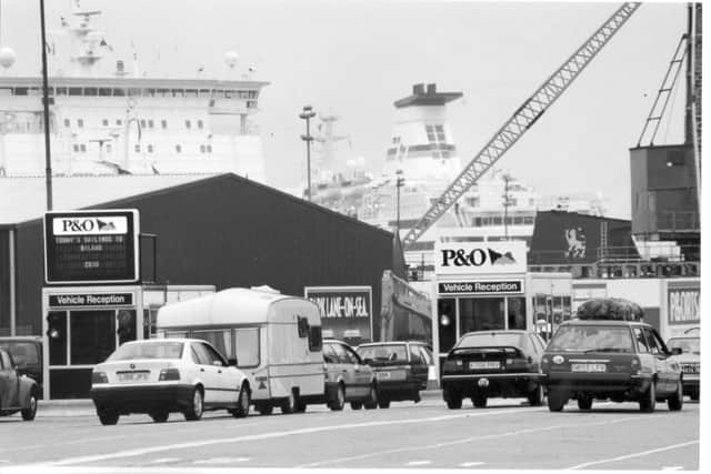 Holiday queues - cars waiting to board the P&O ferry to Bilbao at the ferry port in July 1994