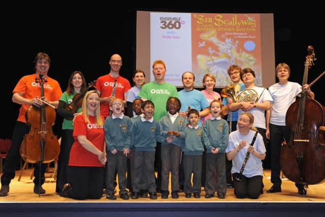 These children from St John's Cathedral Catholic Primary School met Ensemble 360 on stage after the event 

Picture by:  Malcolm Wells (160118-6099)
