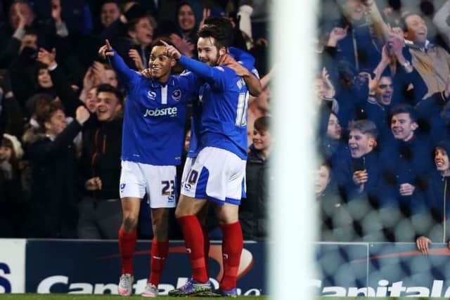 Pompey celebrate Marc McNulty's goal. Picture: Joe Pepler