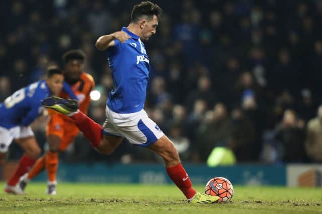 Gary Roberts scores from the spot. Picture: Joe Pepler