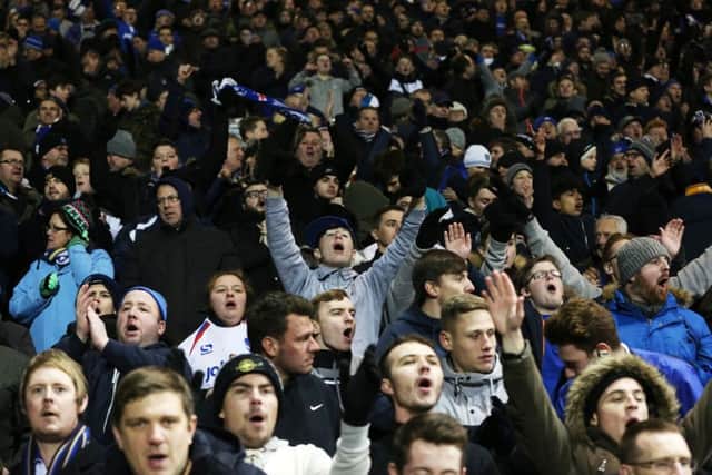 Pompey fans cheering on the Blues against Ipswich on Tuesday night. Picture: Joe Pepler