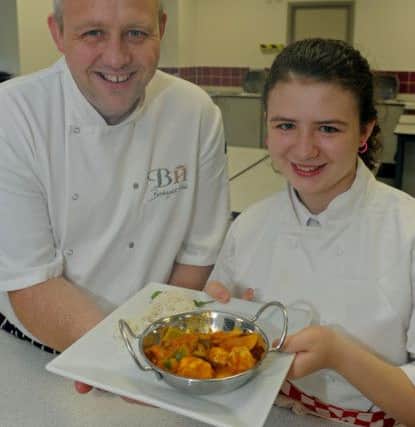 Panel judge Jon Scourfield, the head chef at Brookfield Hotel in Emsworth, with winner Izabella Darmanin Picture Ian Hargreaves (151852-4)