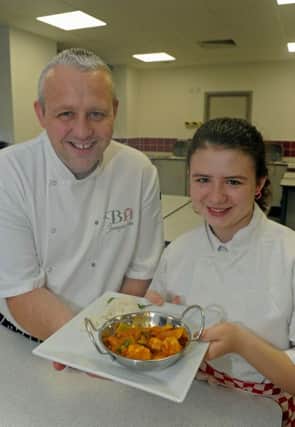 Panel judge Jon Scourfield, the head chef at Brookfield Hotel in Emsworth, with winner Izabella Darmanin Picture Ian Hargreaves (151852-4)