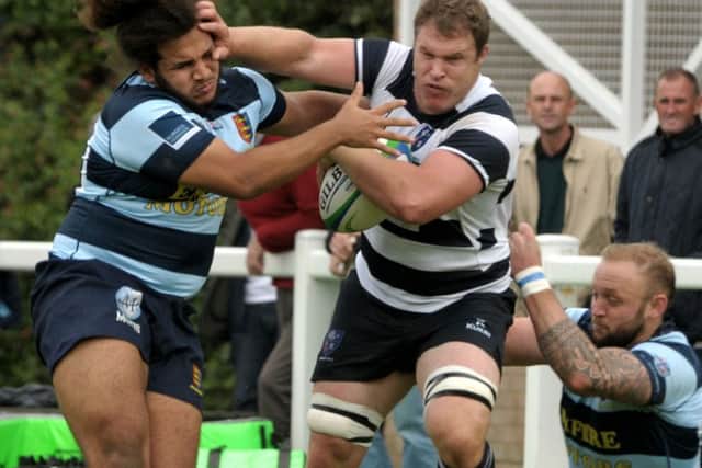 Jack Ward-Golden hands off a tackle. Pic Mick Young