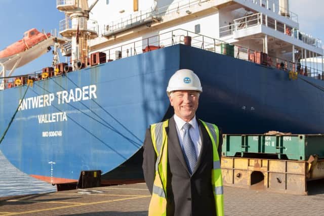 Port manager Martin Putman by the Maersk Antwerp Trader, the largest cargo vessel to ever arrive in Portsmouth