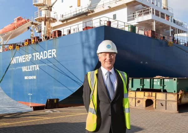 Port manager Martin Putman by the Maersk Antwerp Trader, the largest cargo vessel to ever arrive in Portsmouth