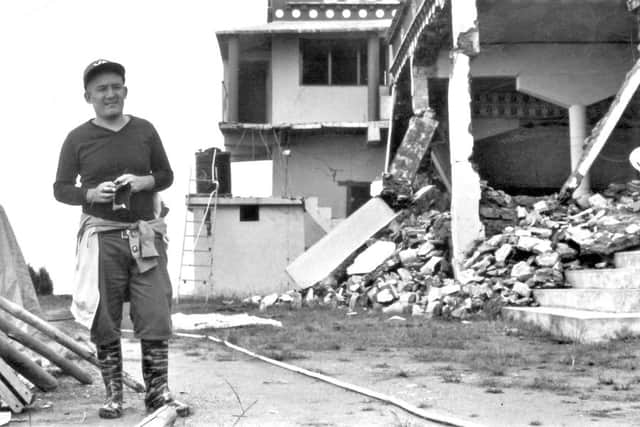 Tshering in his wrecked village of Gangyul, Nepal