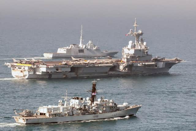 HMS St Albans joined forces with the Charles de Gaulle French Carrier Strike Group (CSG) in the Middle East. PHOTO: SM Cindy Luu