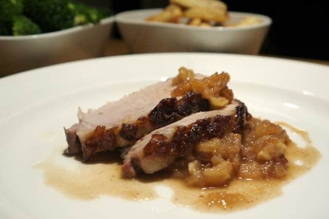 Roast loin of pork with Bramley apple, honey and cinnamon