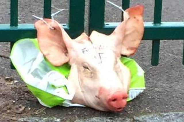 The pig's head left tied to the Madani Academy gates