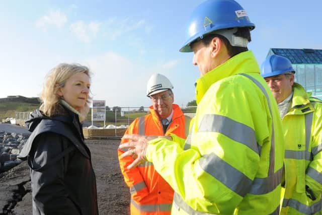 Environment secretary Liz Truss talking to Alan Cufley, Head of Transport Environment and Business Services