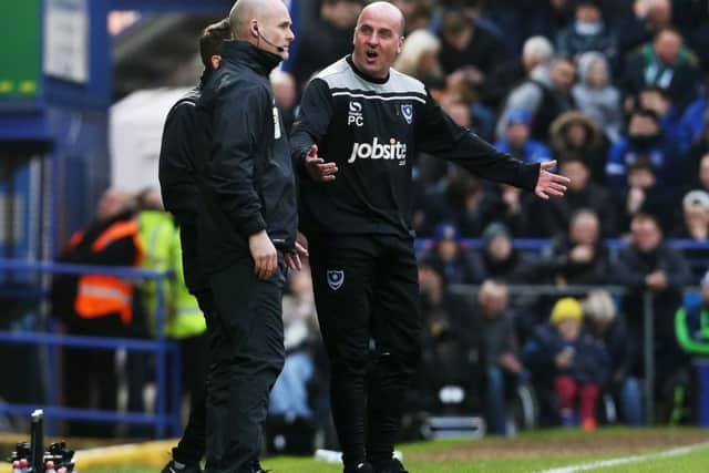 Pompey manager Paul Cook remonstrates with the fourth official during today's game Picture: Joe Pepler
