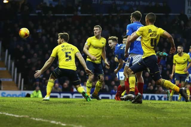 Adam McGurk tries his luck with a header Picture: Joe Pepler