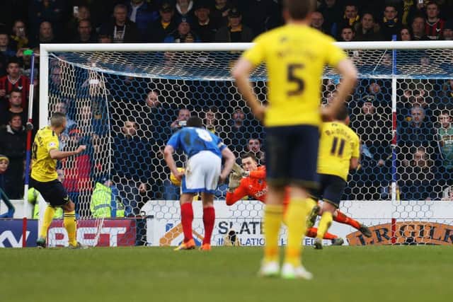 Ryan Fulton saves Liam Sercombe's penalty Picture: Joe Pepler