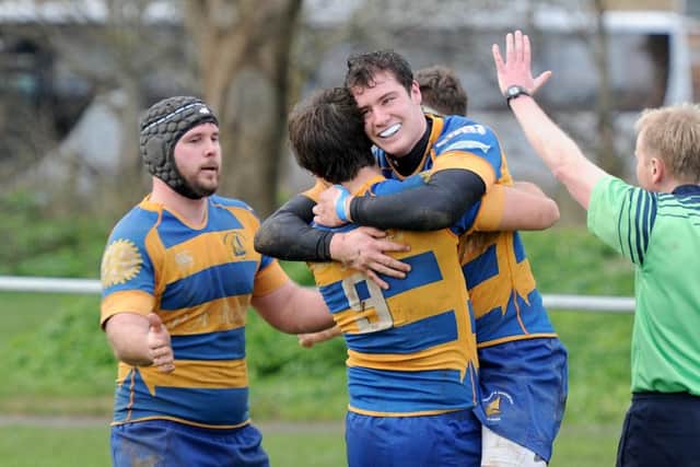 Tom Lewis, right, celebrates his try. Picture: Paul Jacobs (160123-9)