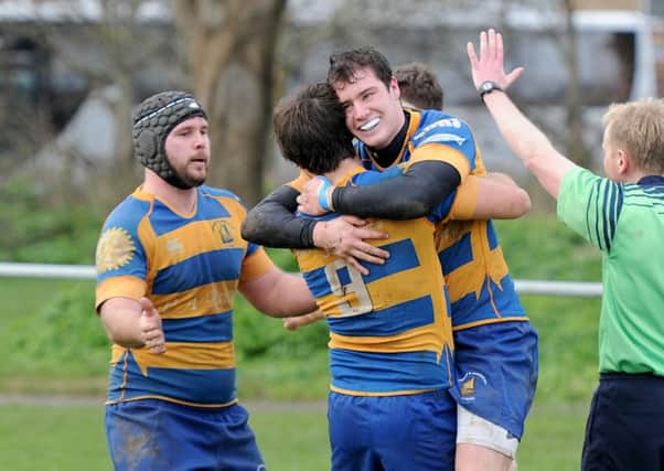 Tom Lewis, right, celebrates his try. Picture: Paul Jacobs (160123-9)