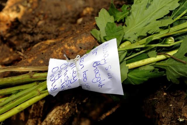 Flowers at the scene of the crash