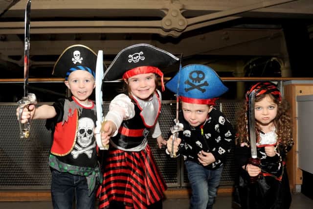 Children from Fairfield Infant School in Havant were dressed as pirates for an activities day at Action Stations in Portsmouth Historic Dockyard.
From left, Arthur Cullum, six,, Zoe Healey, six, Jesse Heath, five, and Ellayna Cutler, five
Picture: Sarah Standing (160118-9559)