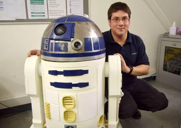 Chris Wheeler with his custom-built R2D2 gaming computer 
Picture: Tom Cotterill