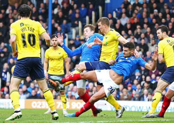 Gareth Evans battles for the ball against Oxford. Picture: Joe Pepler