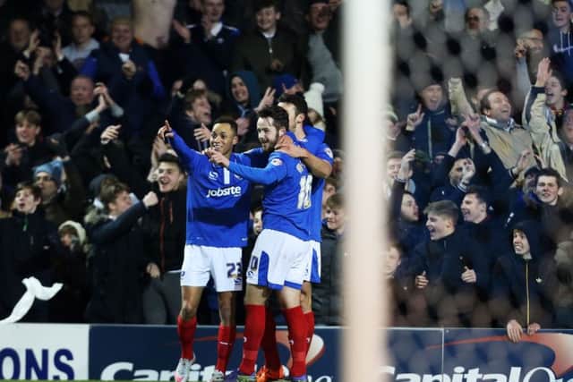 Joy at Fratton Park after Marc McNulty's goal against Ipswich. Picture: Joe Pepler