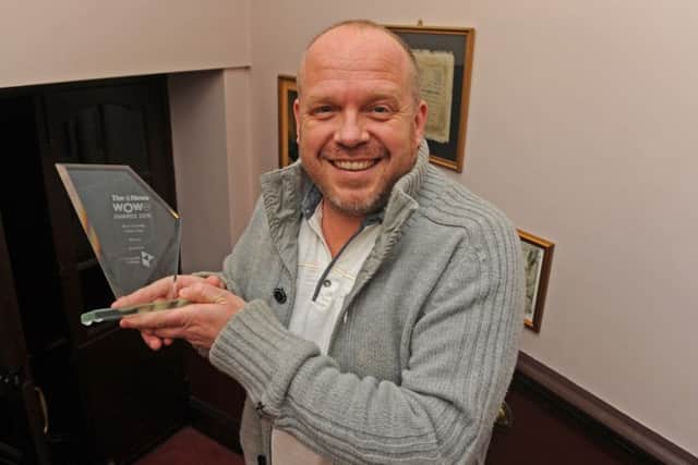 James Alderson with his award for best comedy