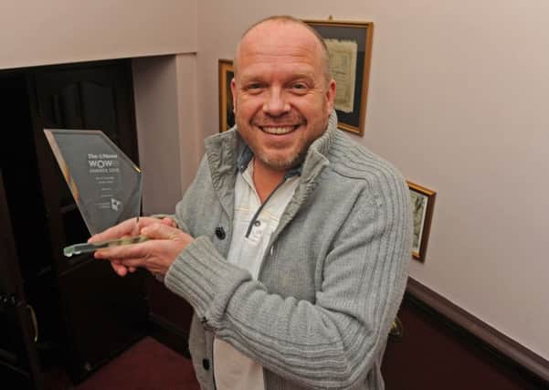 James Alderson with his award for best comedy