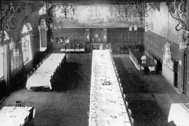 The wardroom for officers from HM Barracks set for an official dinner. Note the murals.