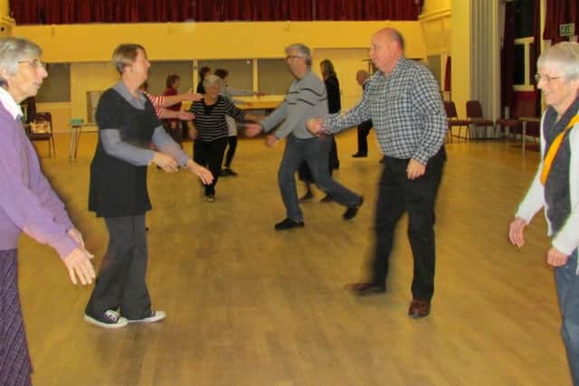 MOVERS AND SHAKERS Dancers having fun at the Waterlooville Folk Dance Group