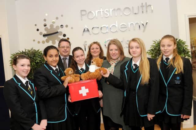 From left, Caen Johnstone, Lina Alotaibi, Richard Reynolds, Regan Taylor, principal Natalie Sheppard, leader of Portsmouth City Council Donna Jones, Evelina Nedvecka and Isabelle Brydon Picture: Sarah Standing (160102-8452)