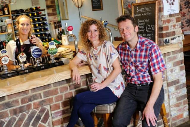 From left, Vicky Bolton, landlady Angie Ryan and landlord Steve Pratt at the
Fox and Hounds pub in Denmead
Picture: Allan Hutchings (151518-066)