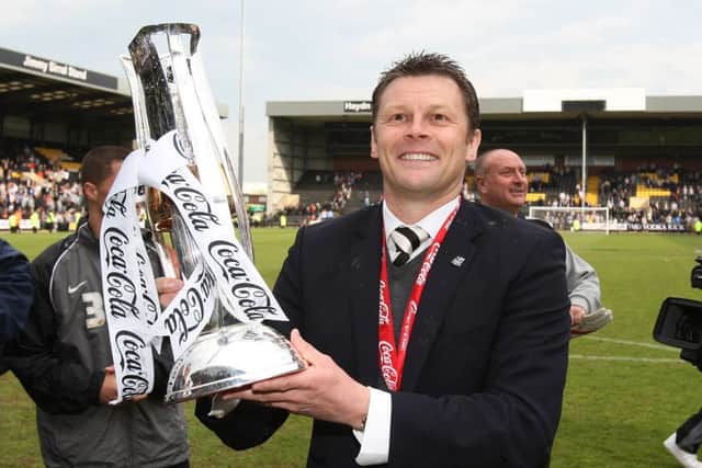 Steve Cotterill celebrates his League Two success with Notts County