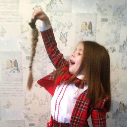 Six-year-old Lillie Davies of Copnor, who had 35cm of hair cut off for the Little Princess Trust
