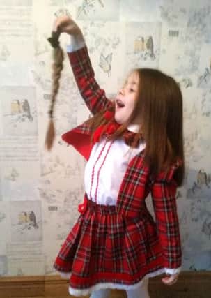 Six-year-old Lillie Davies of Copnor, who had 35cm of hair cut off for the Little Princess Trust