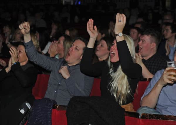 The audience cheer on a winner at this year's WOW247 Awards