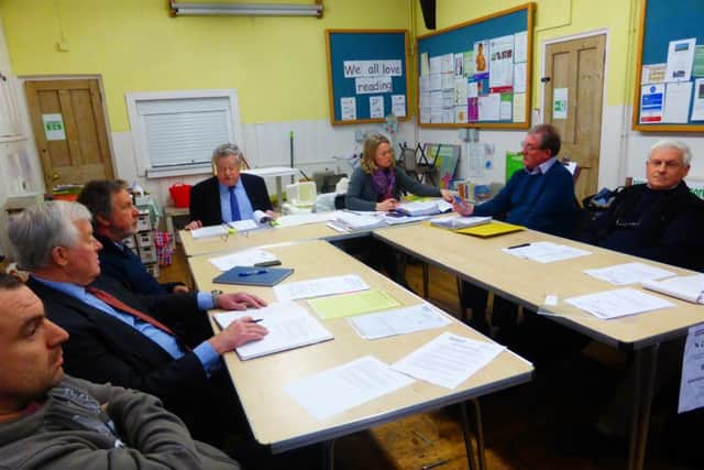 The extraordinary council meeting of Rowlands Castle Parish Council
Chairman John Pickering is the top left with the committee around him