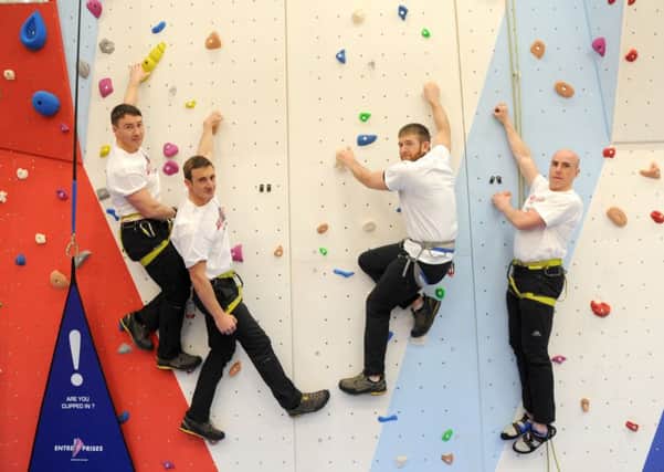 PO Mat Jones, 33, CPL Matt Carter, 30, AET Carl Stubbs, 27, and LPT Ian 'Smokey' Cole, 36, have all completed the Adventure Training Leaders course, and are pictured on the new indoor climbing wall

Picture: Sarah Standing (160163-309)