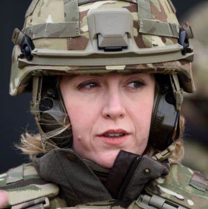 Armed Forces Minister Penny Mordaunt before watching a live firing exercise by members of the Infantry Battle School at the Sennybridge Training Area in the Brecon Beacons, Wales. PHOTO:: Andrew Matthews/PA Wire POLITICS_Army_180970.JPG